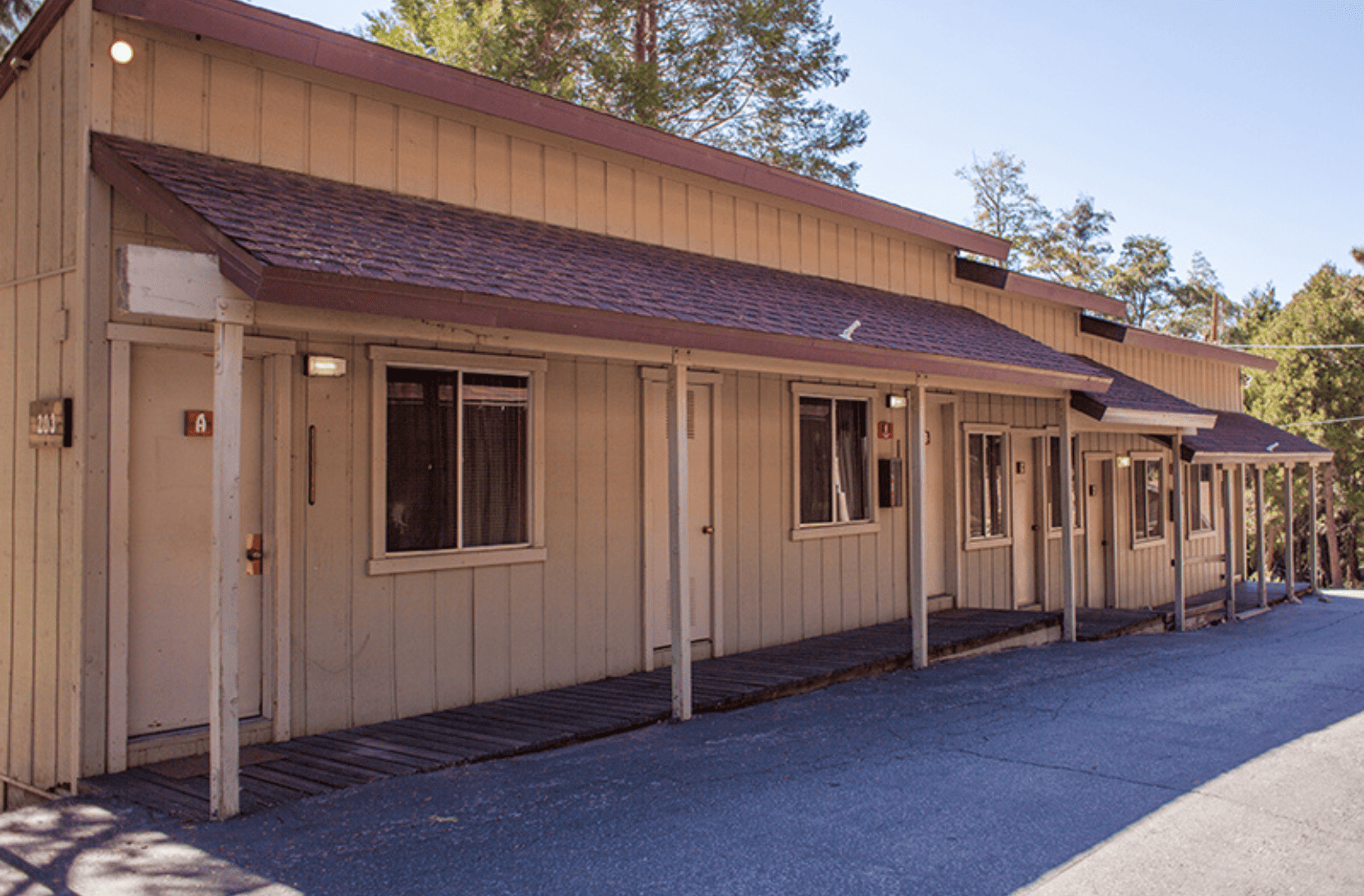 Outside view of a row of cabins where campers sleep