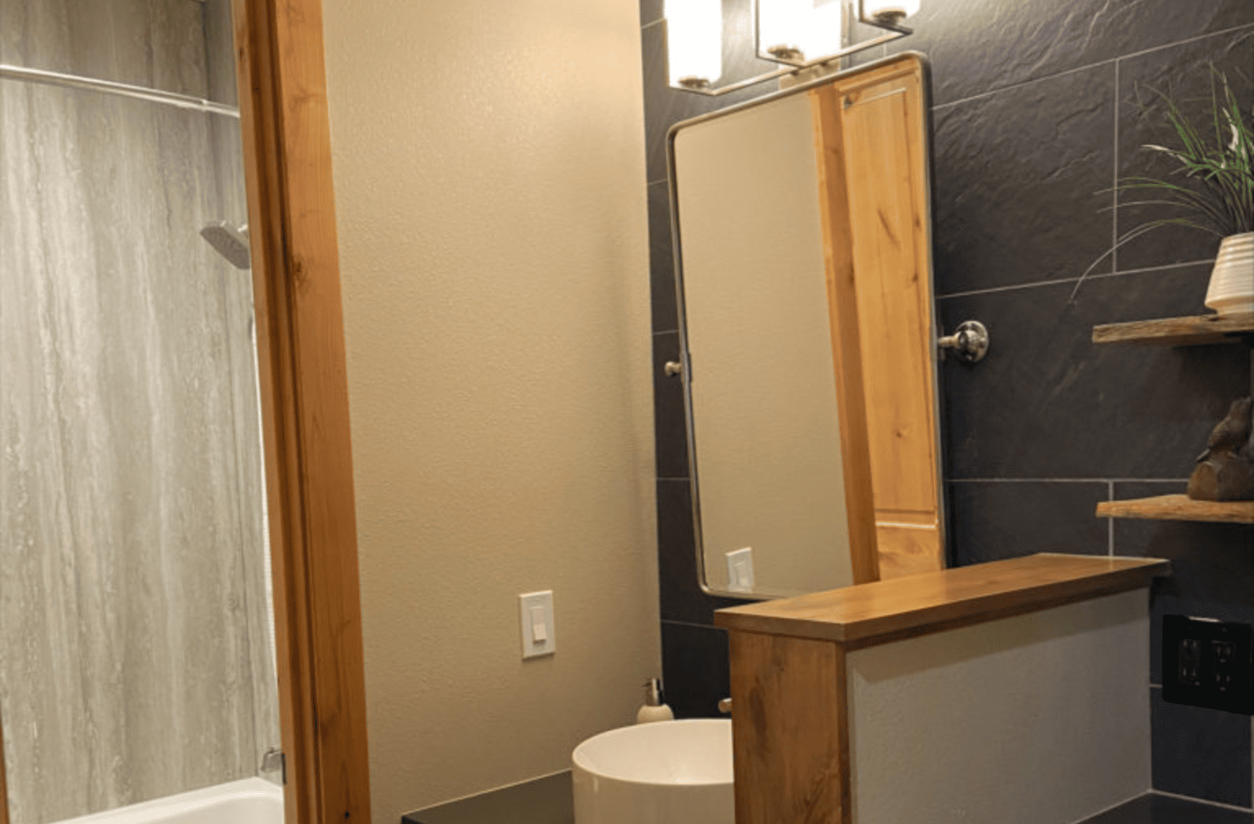 bathroom with a raised sink
